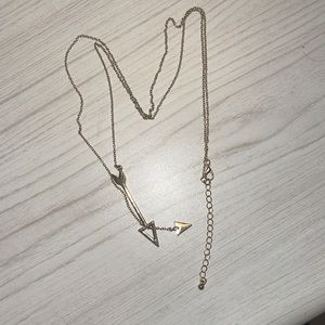 Long gold arrow necklace